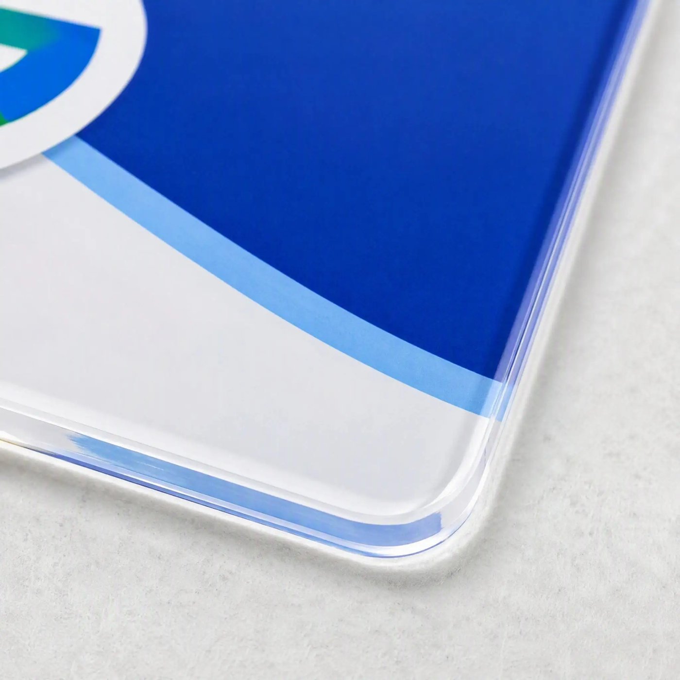 Close up of the card's polished acrylic edge